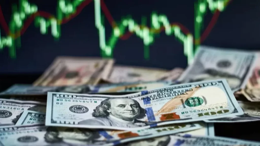 Dólar abre em queda após Copom cortar Selic para 14%